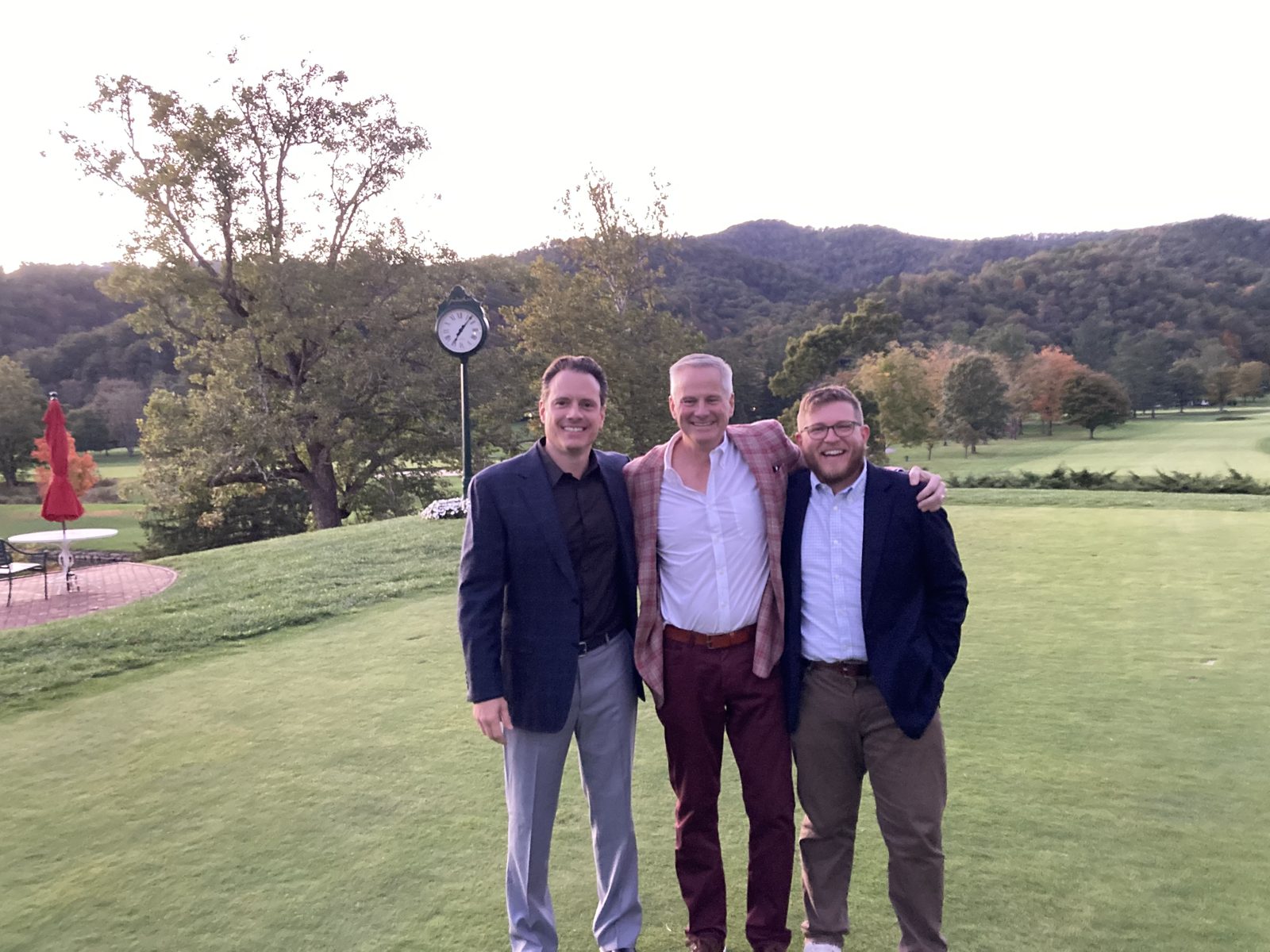 LNE Group team members outdoors at sunset