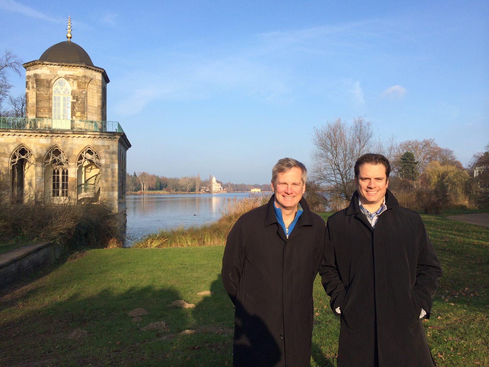 LNE Group team members by a lake in winter