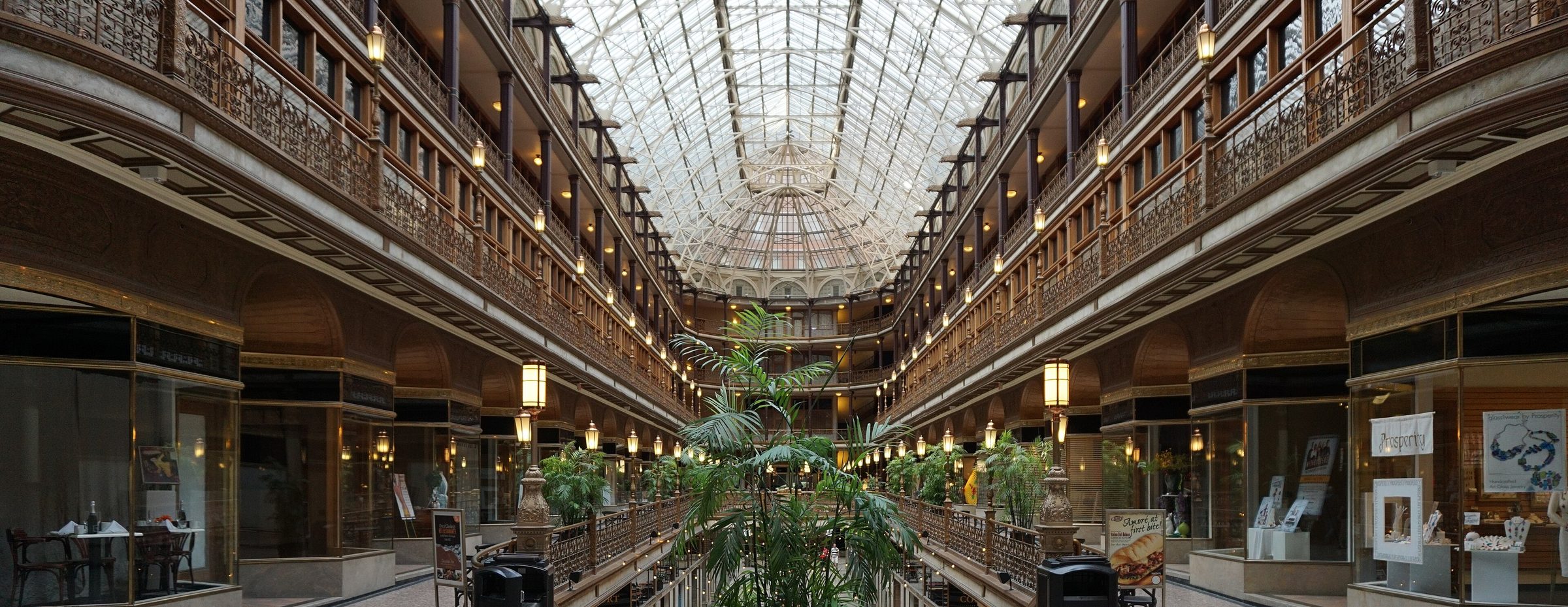A historic commercial arcade with a glass skylight